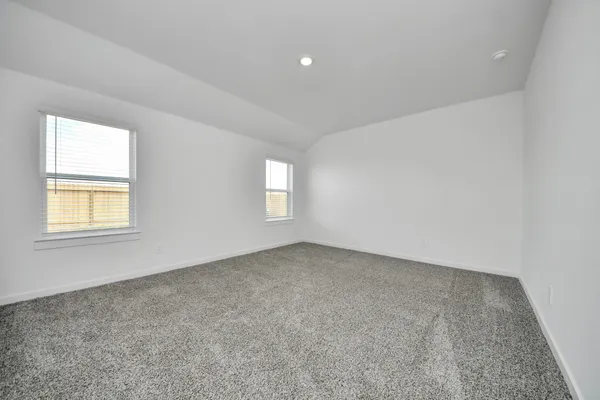 a bathroom with a double vanity sink and mirror