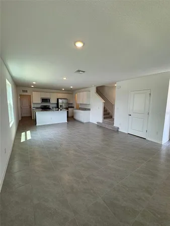 a view of empty room with garage