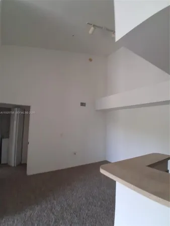a utility room with a sink a washer and dryer