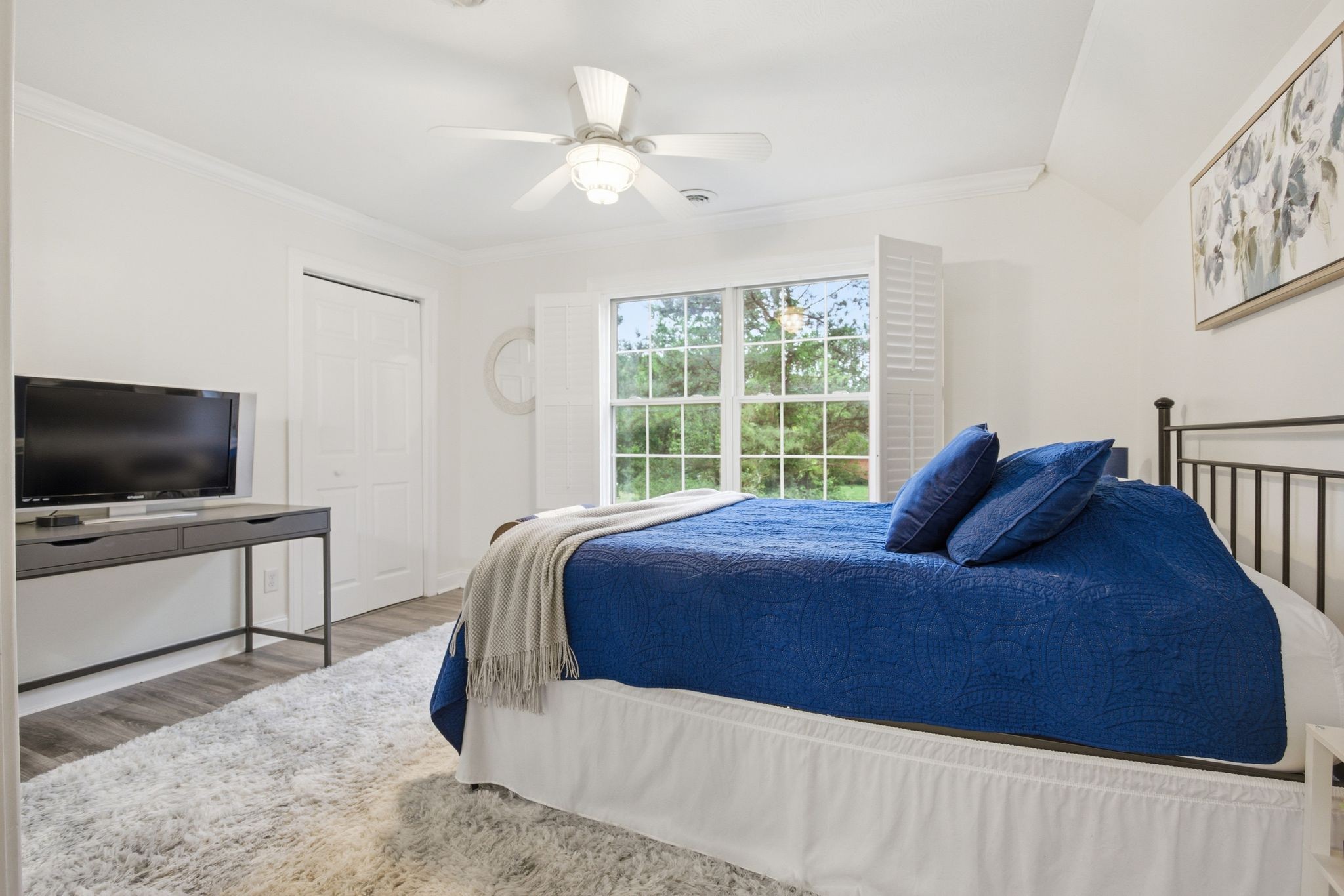 1150 Cochran Cemetery Road Lewisburg, TN 37091 - Photo 22 of 63 a bedroom with a bed and a flat screen tv