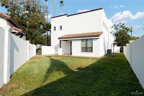 a house view with a garden space