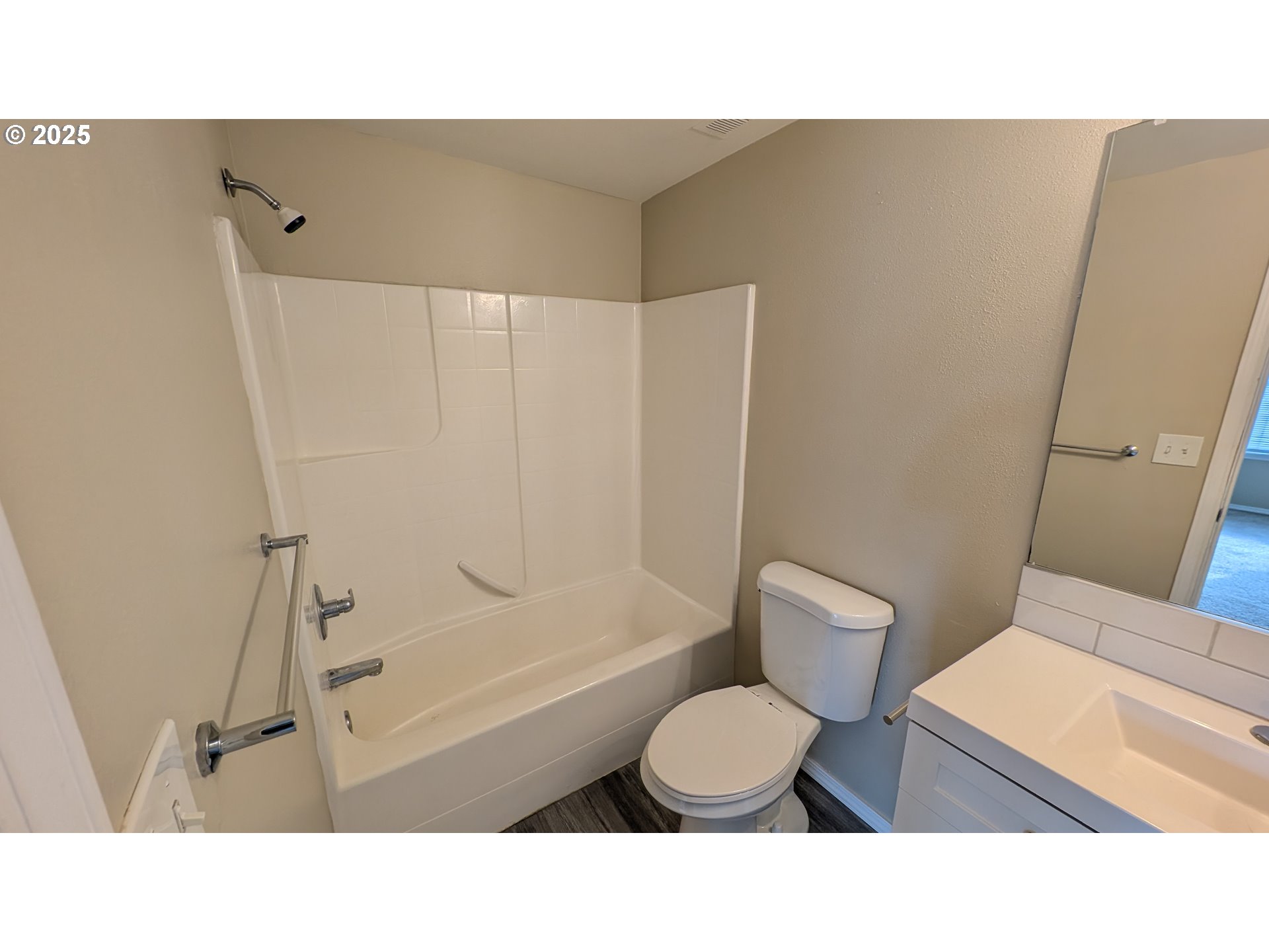 18541 Southwest Takena Court Beaverton, OR 97003 - Photo 23 of 24 a bathroom with a toilet a sink and a shower