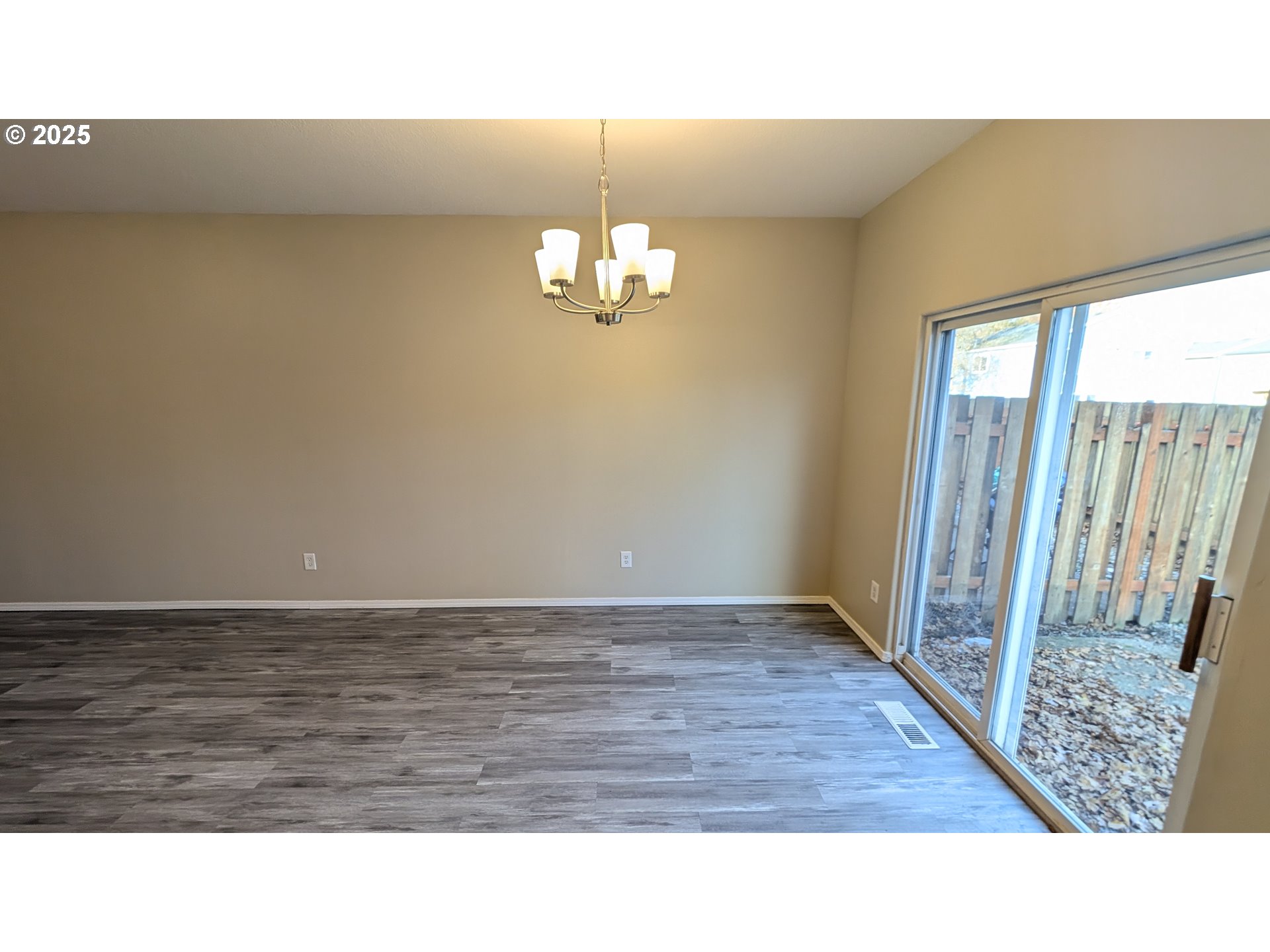 18541 Southwest Takena Court Beaverton, OR 97003 - Photo 5 of 24 a view of a livingroom with wooden floor