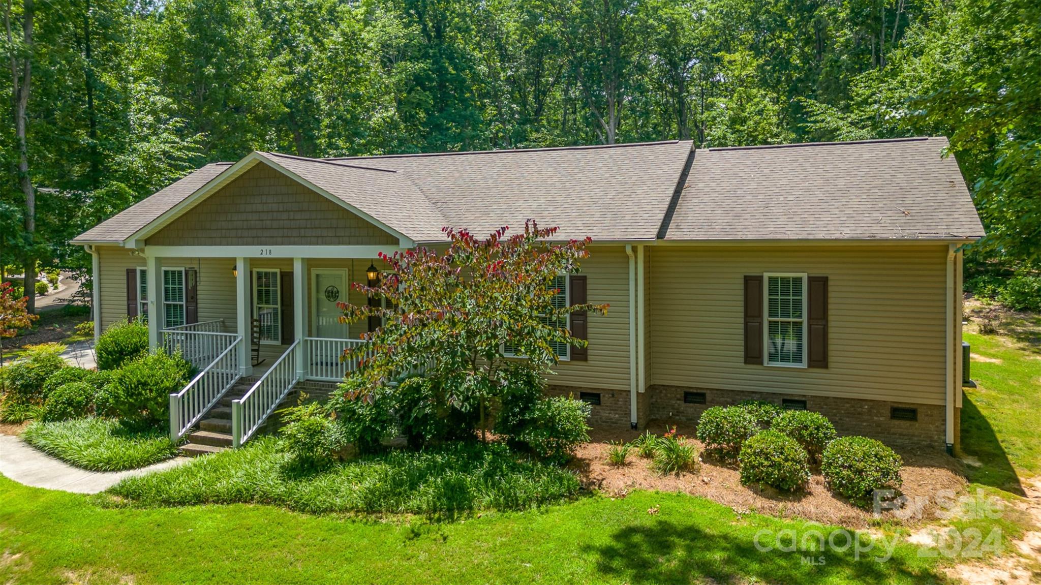 218 Old Hickory Road Locust, NC 28097 - Photo 1 of 38 front view of a house with a yard