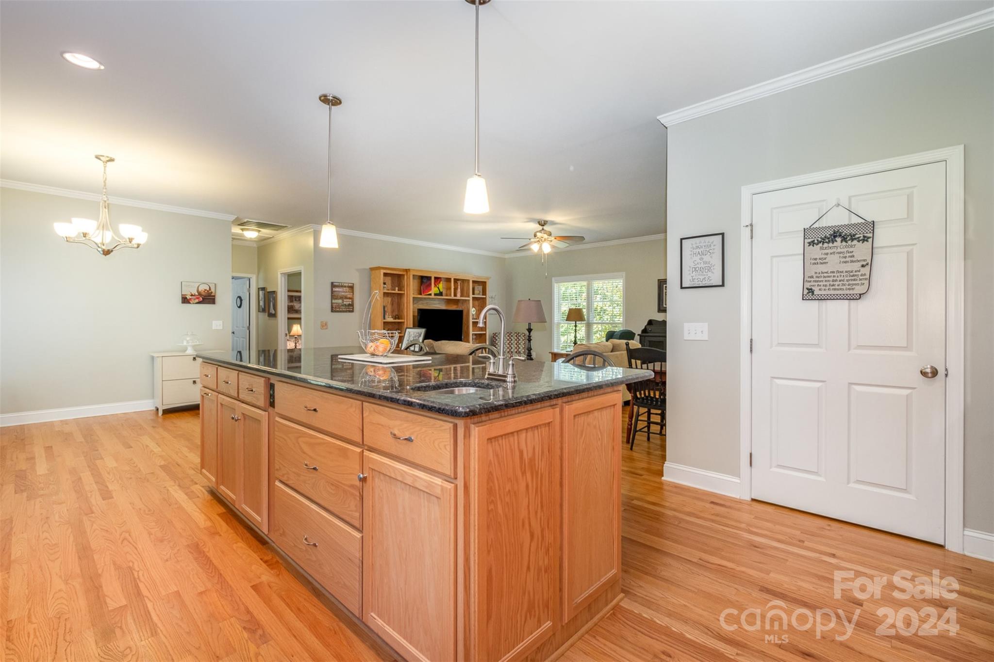 218 Old Hickory Road Locust, NC 28097 - Photo 16 of 38 a large kitchen with kitchen island a sink stainless steel appliances and cabinets