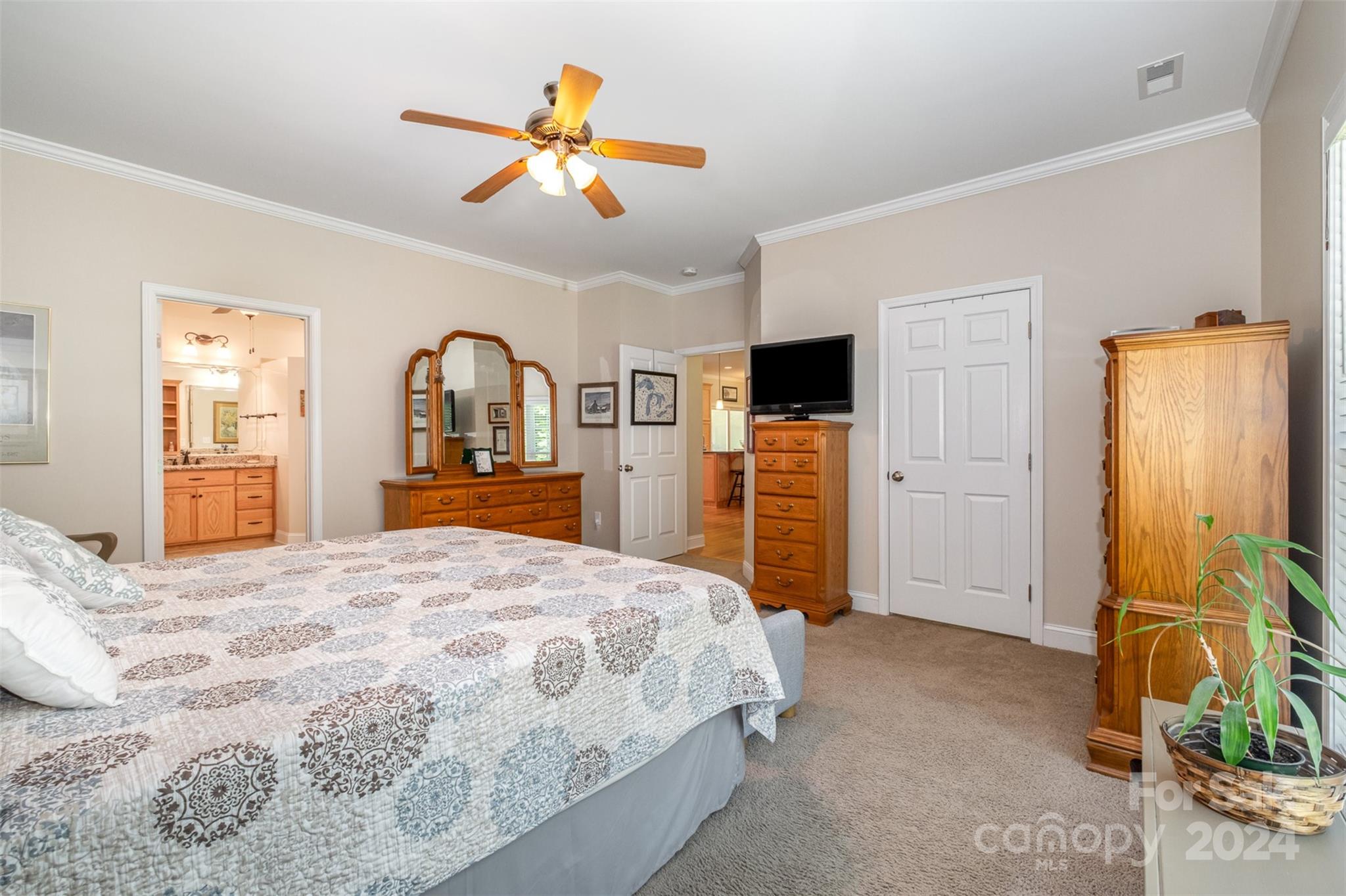 218 Old Hickory Road Locust, NC 28097 - Photo 19 of 38 a bedroom with a bed and a large mirror on dresser