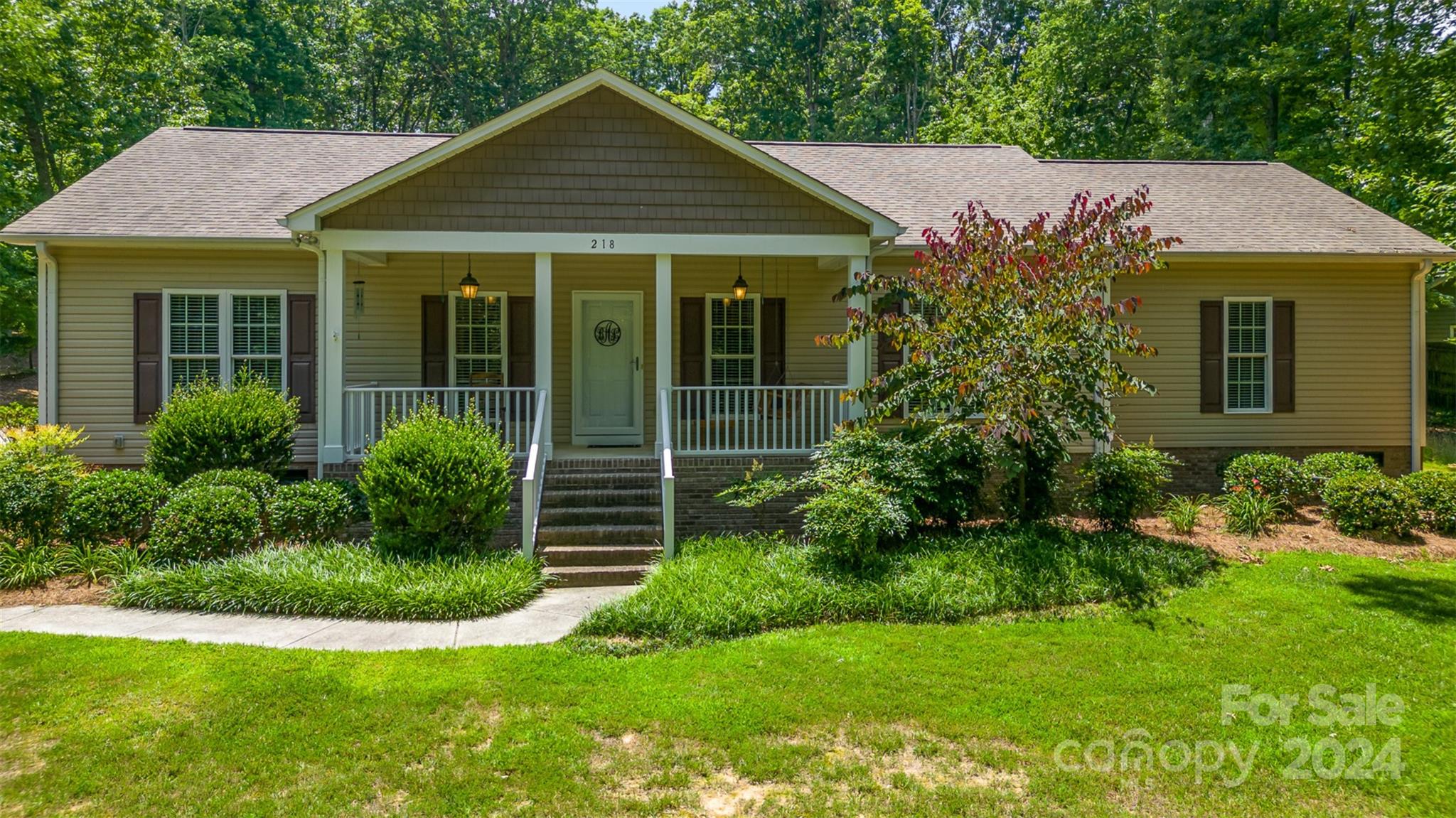 218 Old Hickory Road Locust, NC 28097 - Photo 2 of 38 a view of a house with a yard and potted plants