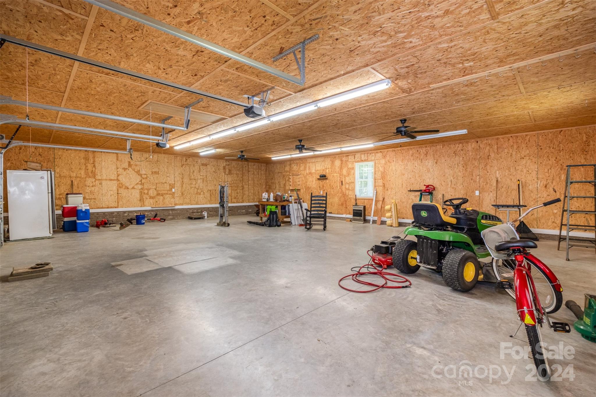 218 Old Hickory Road Locust, NC 28097 - Photo 28 of 38 a view of a room with gym equipment