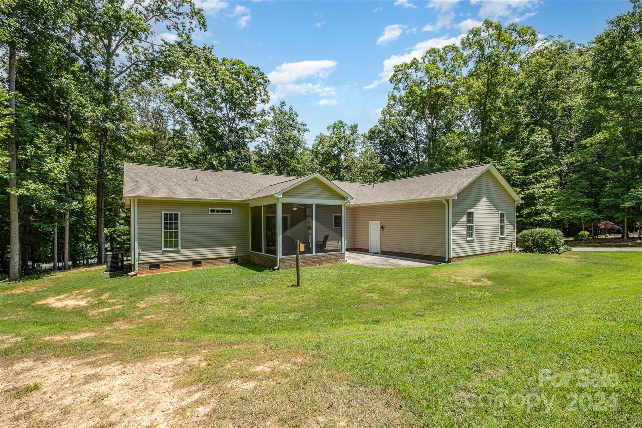218 Old Hickory Road Locust, NC 28097 - Photo 29 of 38 a view of a house with a yard and large tree