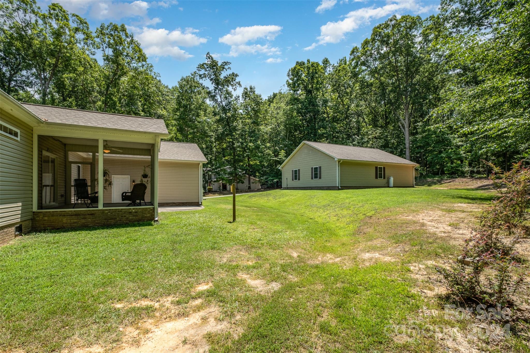 218 Old Hickory Road Locust, NC 28097 - Photo 30 of 38 a house view with a garden space