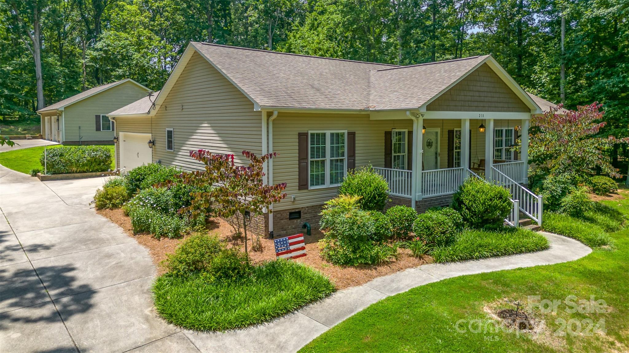 218 Old Hickory Road Locust, NC 28097 - Photo 34 of 38 a view of a house with a yard and potted plants