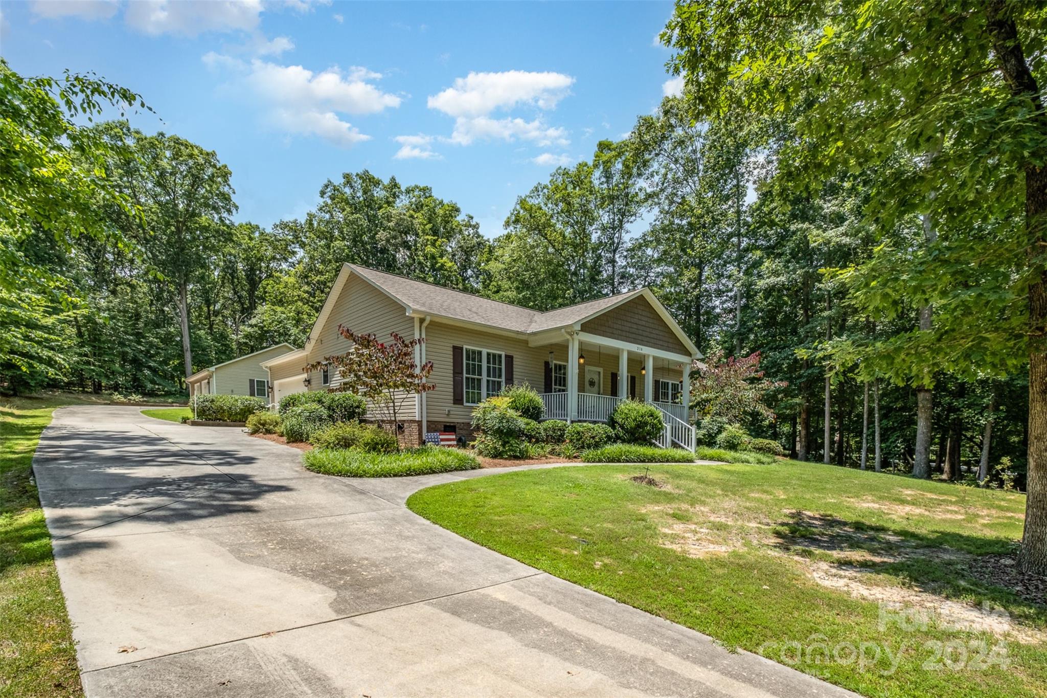 218 Old Hickory Road Locust, NC 28097 - Photo 4 of 38 a front view of a house with a yard