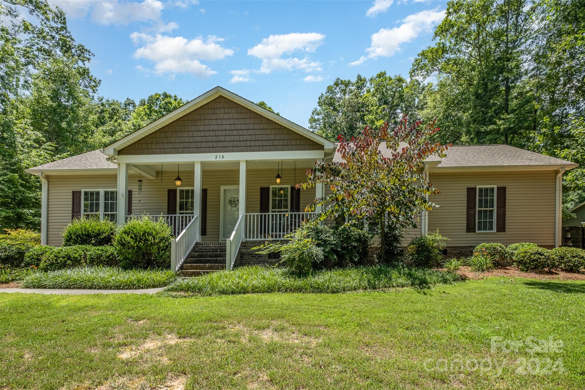 218 Old Hickory Road Locust, NC 28097 - Photo 5 of 38 a view of a house with backyard and garden