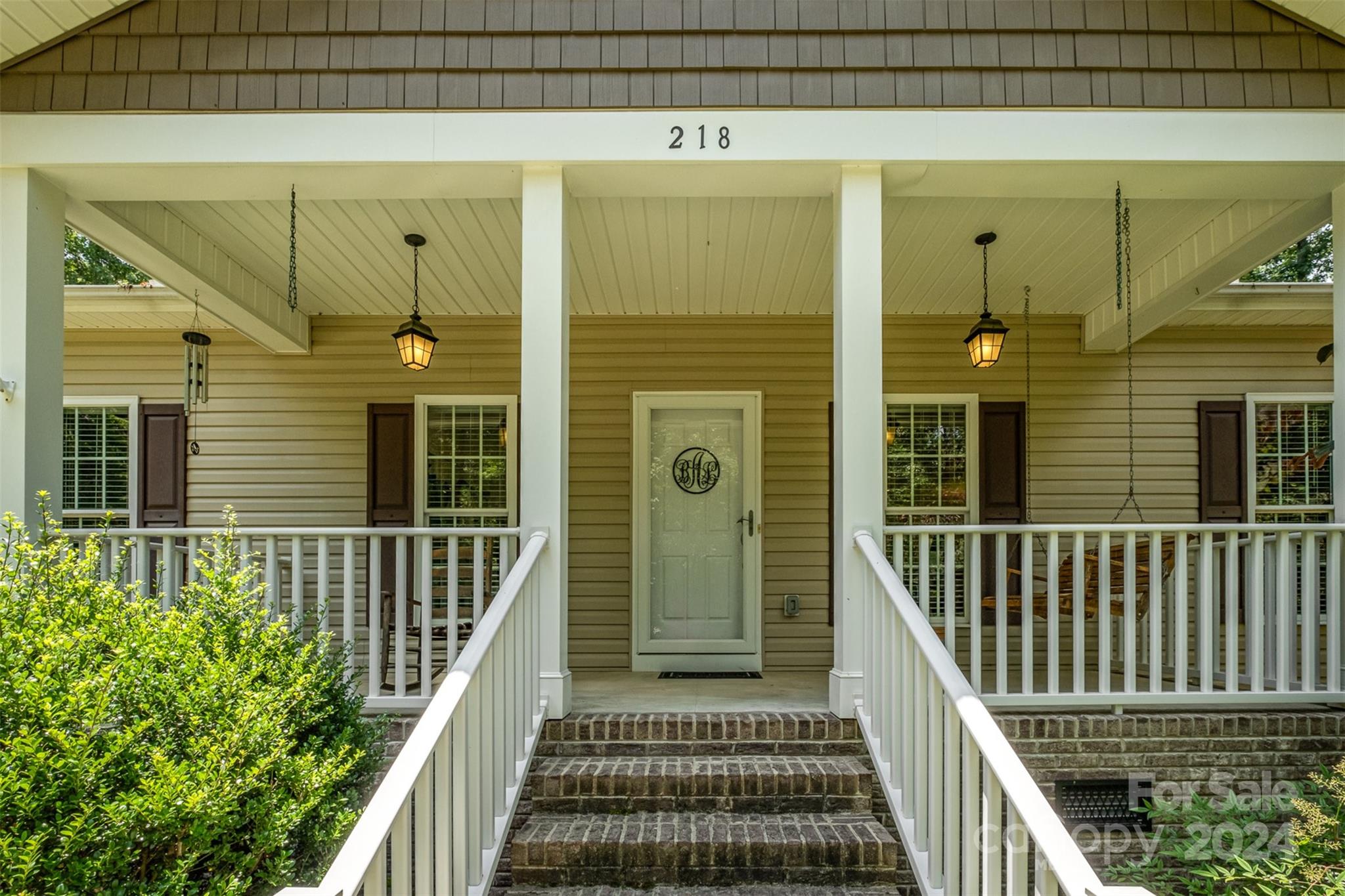 218 Old Hickory Road Locust, NC 28097 - Photo 6 of 38 a view of a balcony with wooden floor and fence