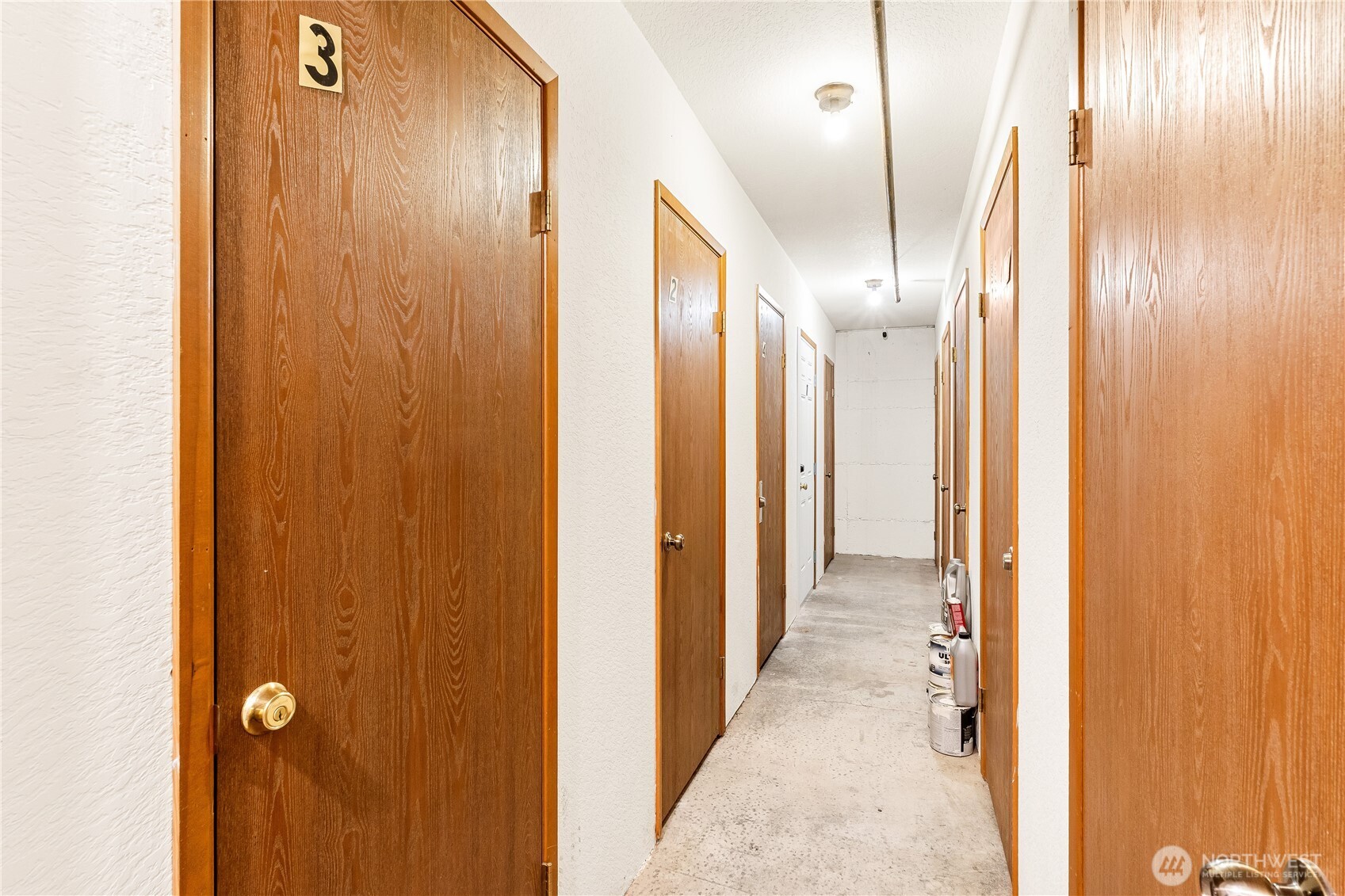 2619 Rucker Avenue, Unit 2 Everett, WA 98201 - Photo 27 of 33 a view of a hallway with wooden floor