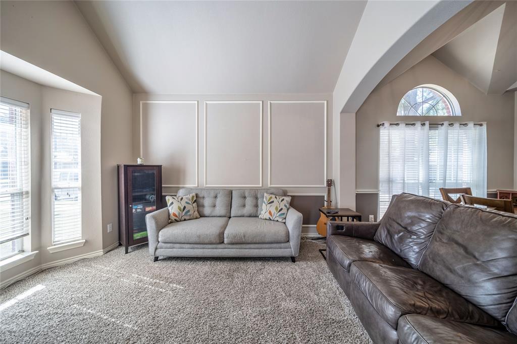 8001 St Fillans Lane Rowlett, TX 75089 - Photo 14 of 40 a living room with furniture and a large window