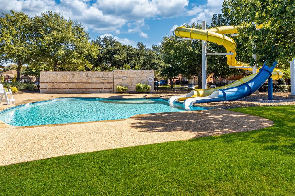 8001 St Fillans Lane Rowlett, TX 75089 - Photo 34 of 40 a view of park with swings