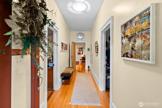 a living room with furniture and a rug