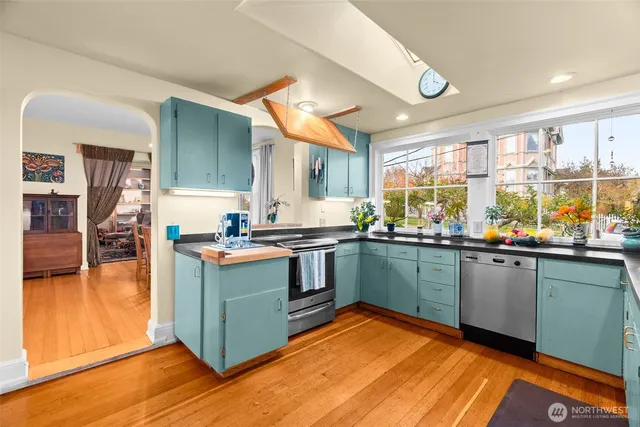 a kitchen with a sink and a window