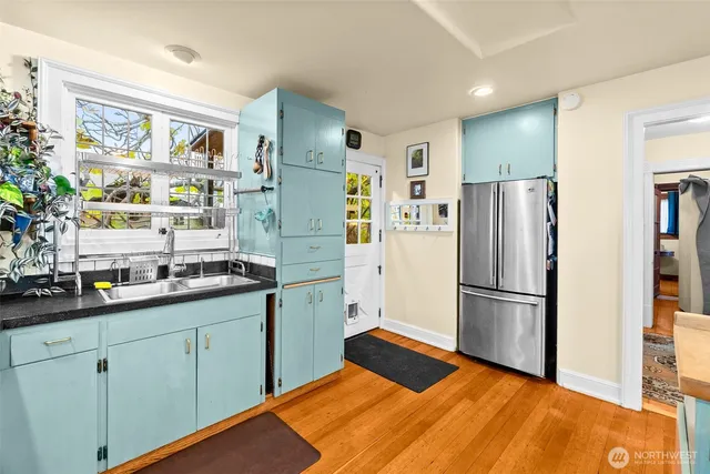 a kitchen with sink and window