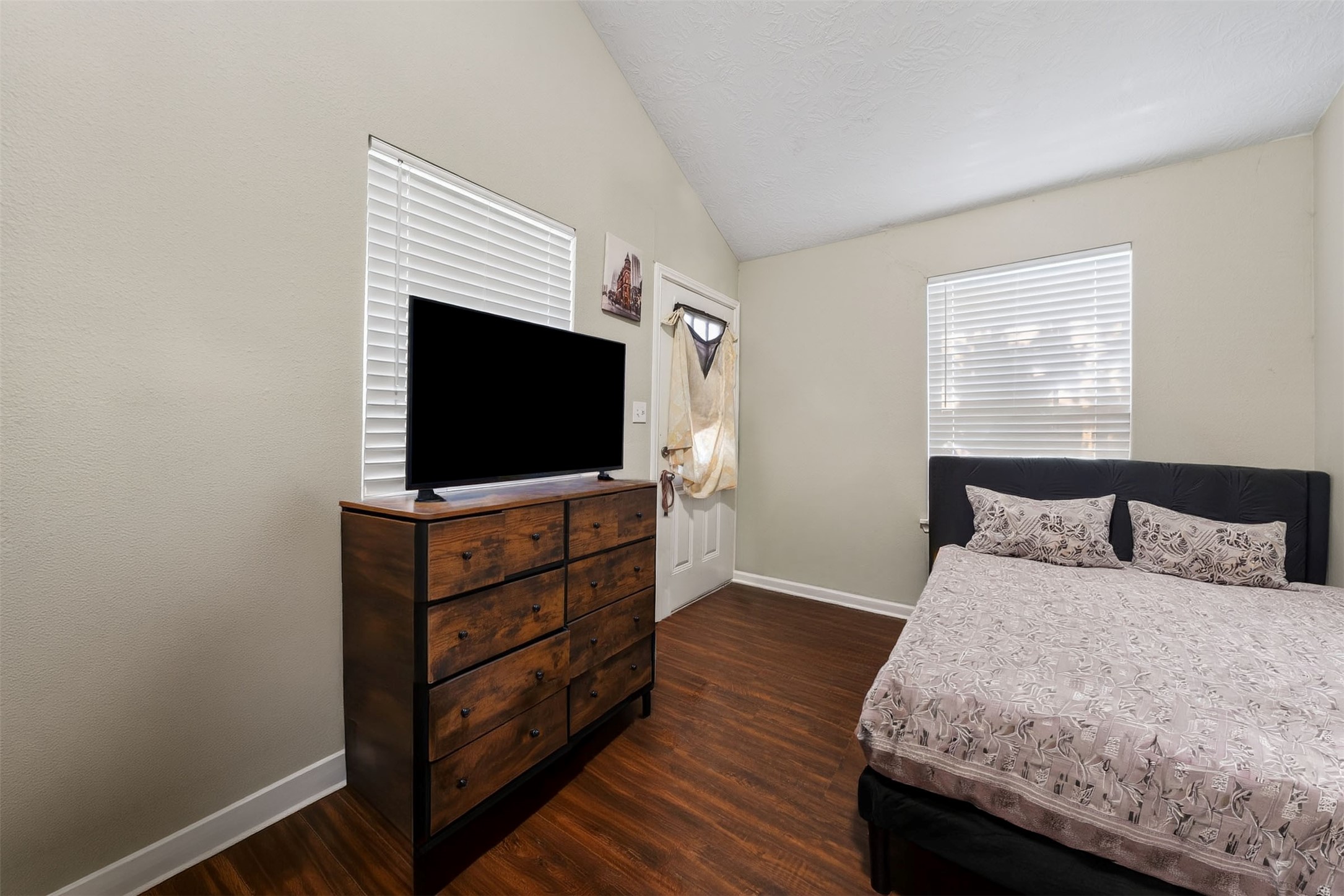 1107 Christine Street Houston, TX 77017 - Photo 11 of 22 a bedroom with a bed and a flat screen tv