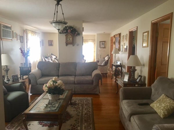 941 Middle Street Fall River, MA 02724 - Photo 2 of 12 a living room with furniture and wooden floor