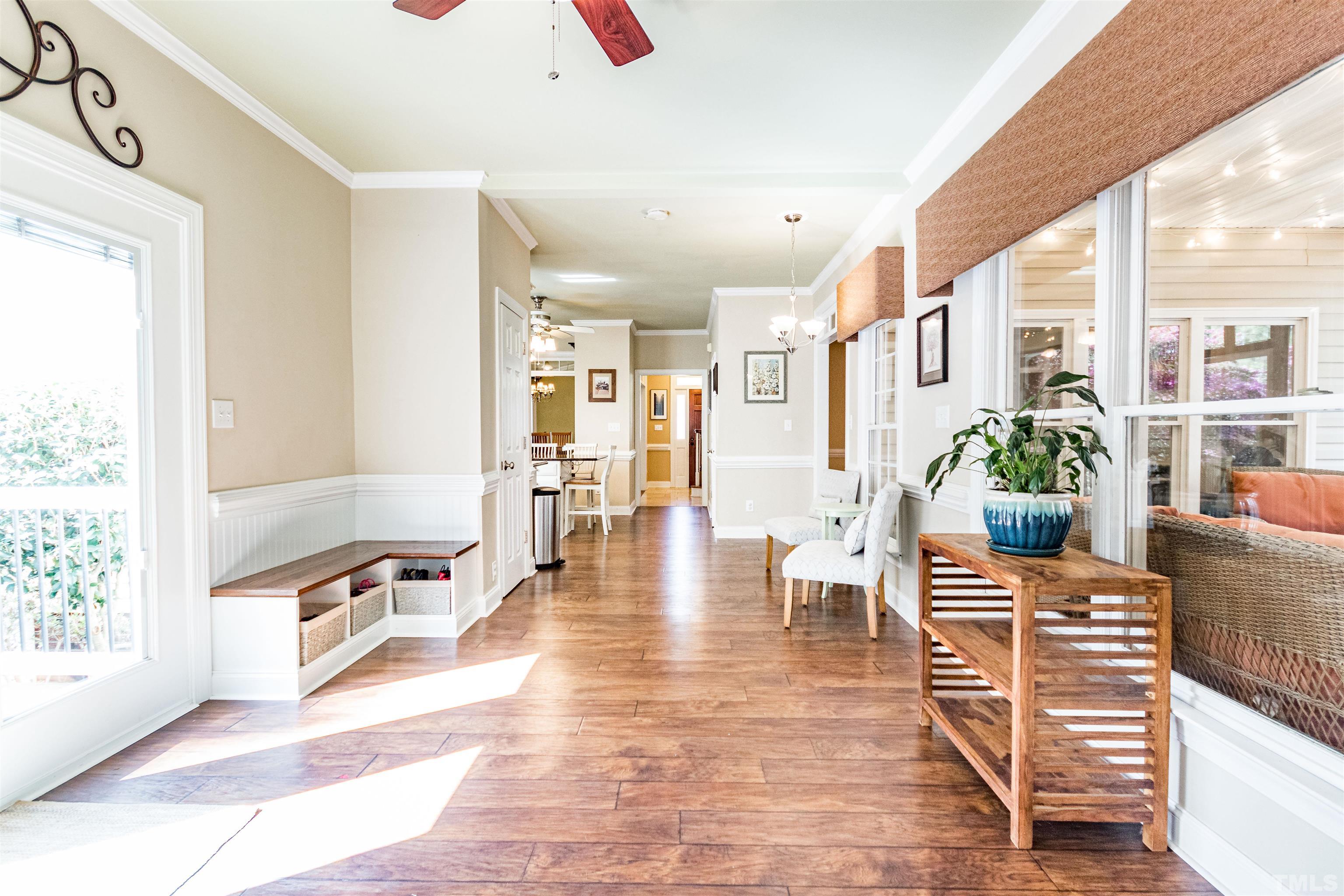 120 Kelsey Court Clayton, NC 27520 - Photo 23 of 62 a dining room with furniture water view and wooden floor