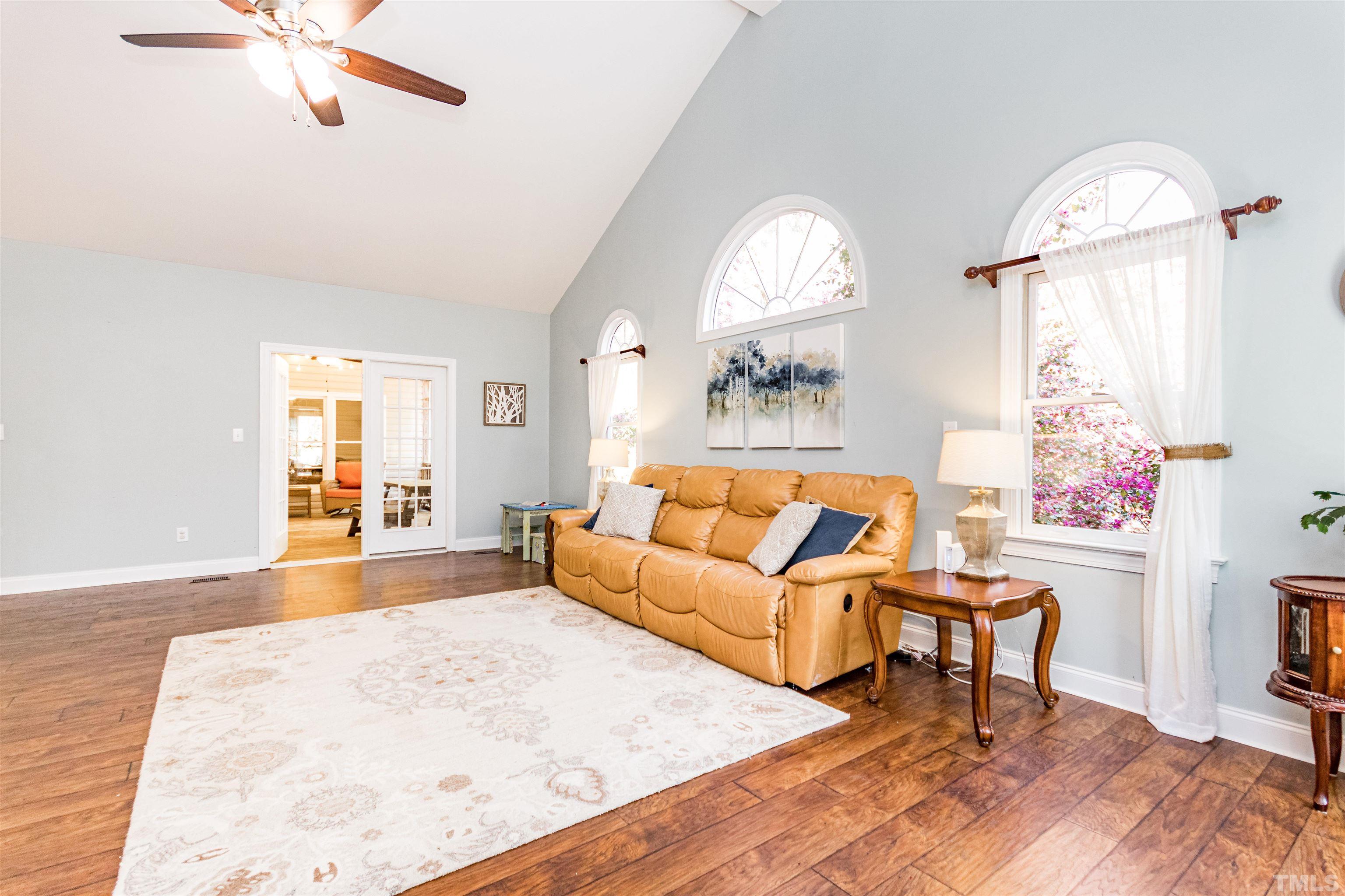 120 Kelsey Court Clayton, NC 27520 - Photo 25 of 62 a living room with furniture and a large window