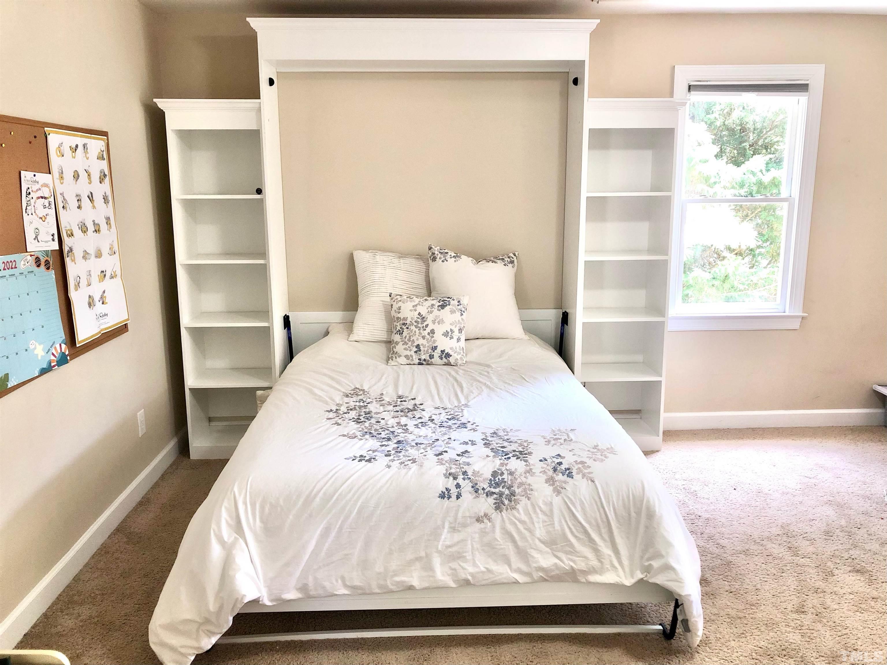 120 Kelsey Court Clayton, NC 27520 - Photo 40 of 62 a bedroom with a bed and a window