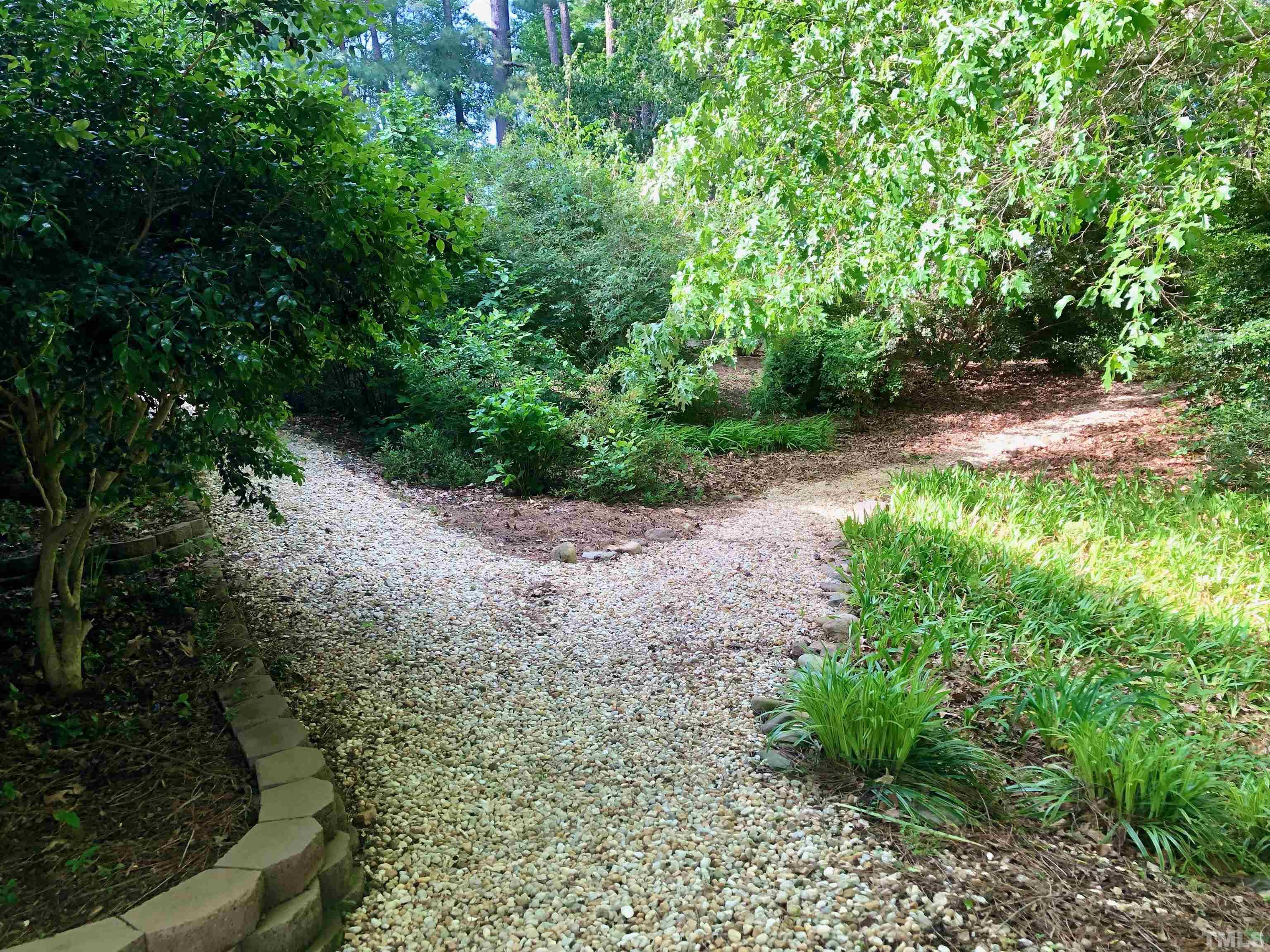 120 Kelsey Court Clayton, NC 27520 - Photo 43 of 62 a pathway of a yard