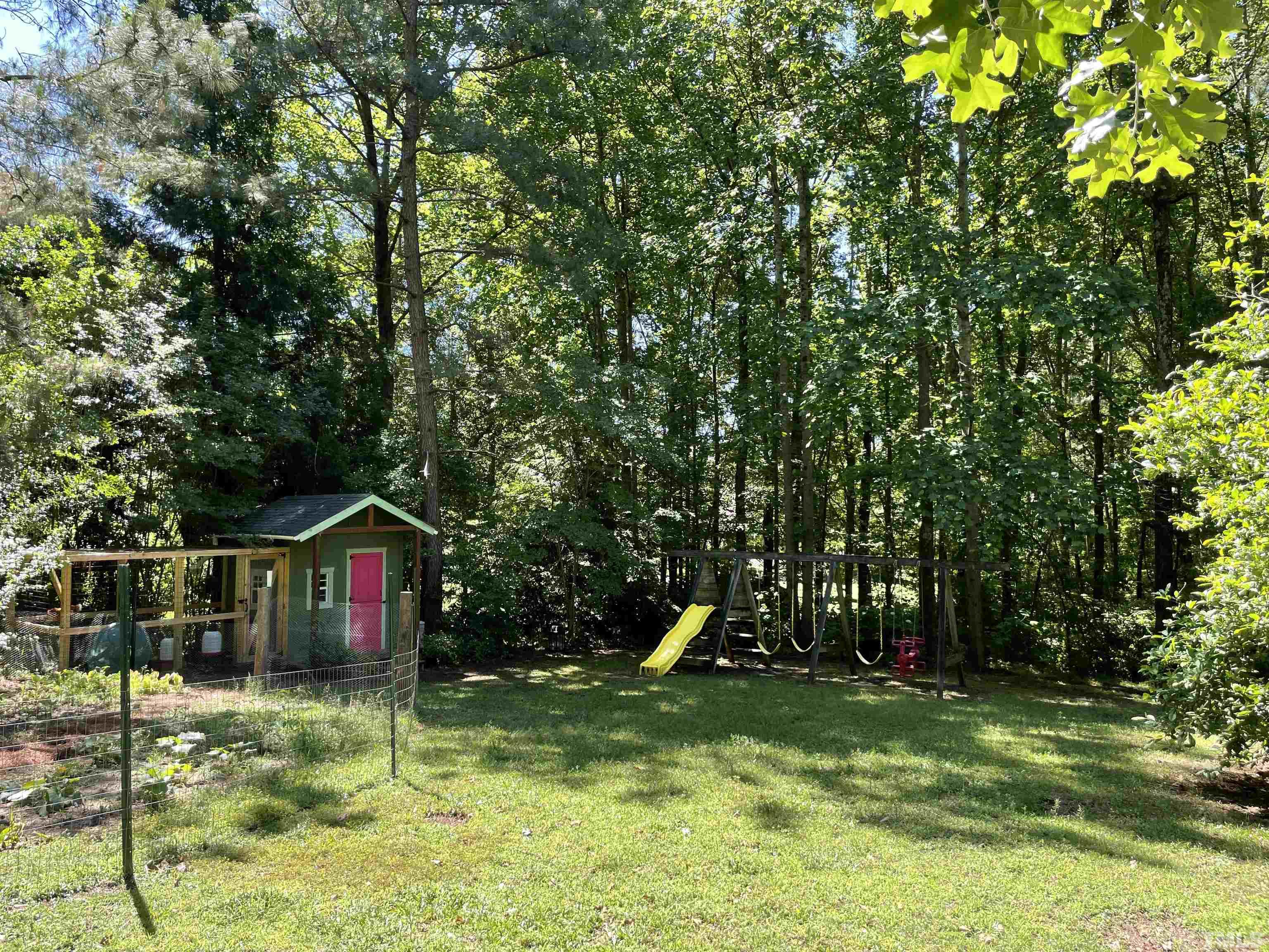 120 Kelsey Court Clayton, NC 27520 - Photo 45 of 62 a view of outdoor space and garden