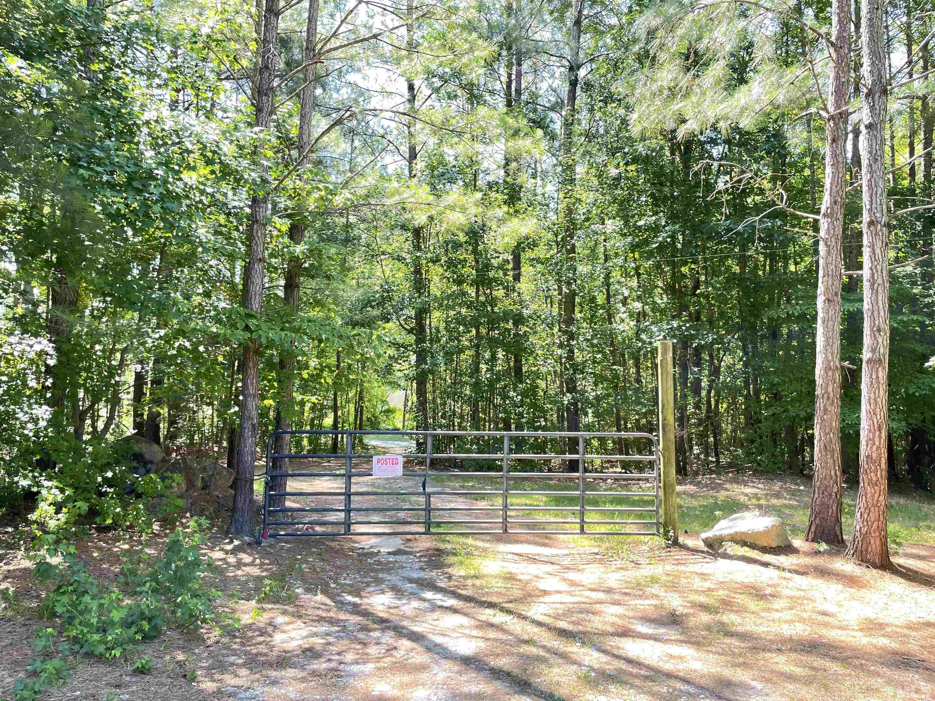 120 Kelsey Court Clayton, NC 27520 - Photo 56 of 62 a view of pool with trees