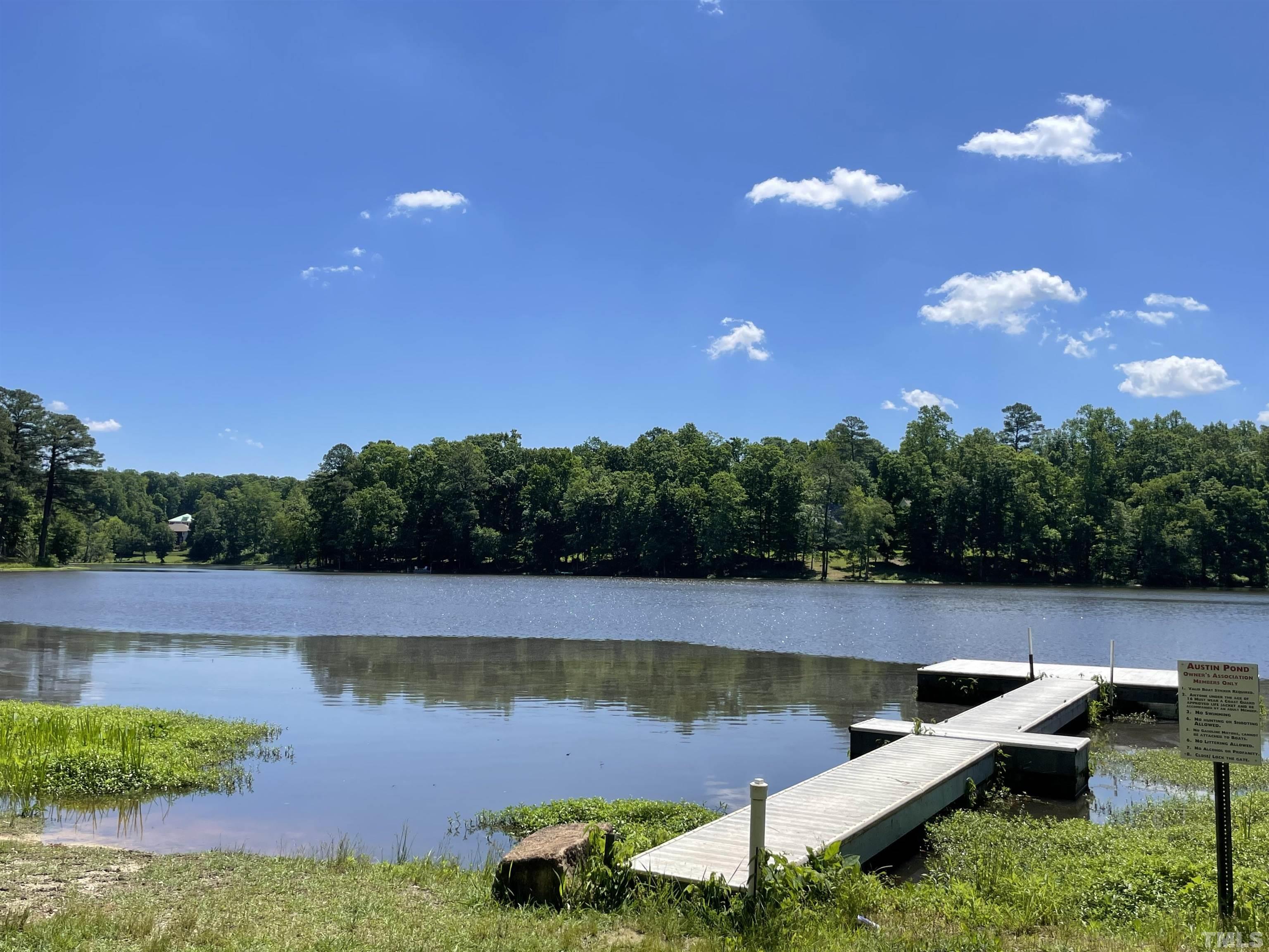 120 Kelsey Court Clayton, NC 27520 - Photo 58 of 62 an aerial view of a house with a lake view