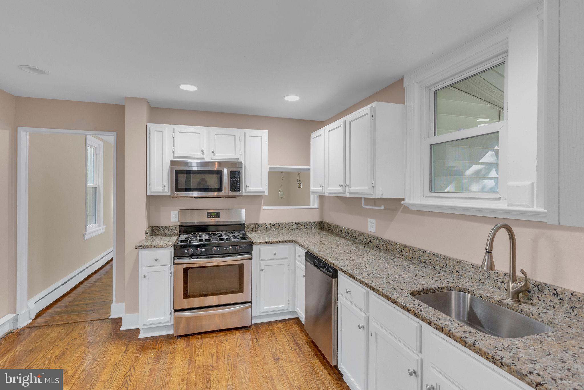 820 Laurel Street Delanco, NJ 08075 - Photo 11 of 24 Modern kitchen with sleek finishes.