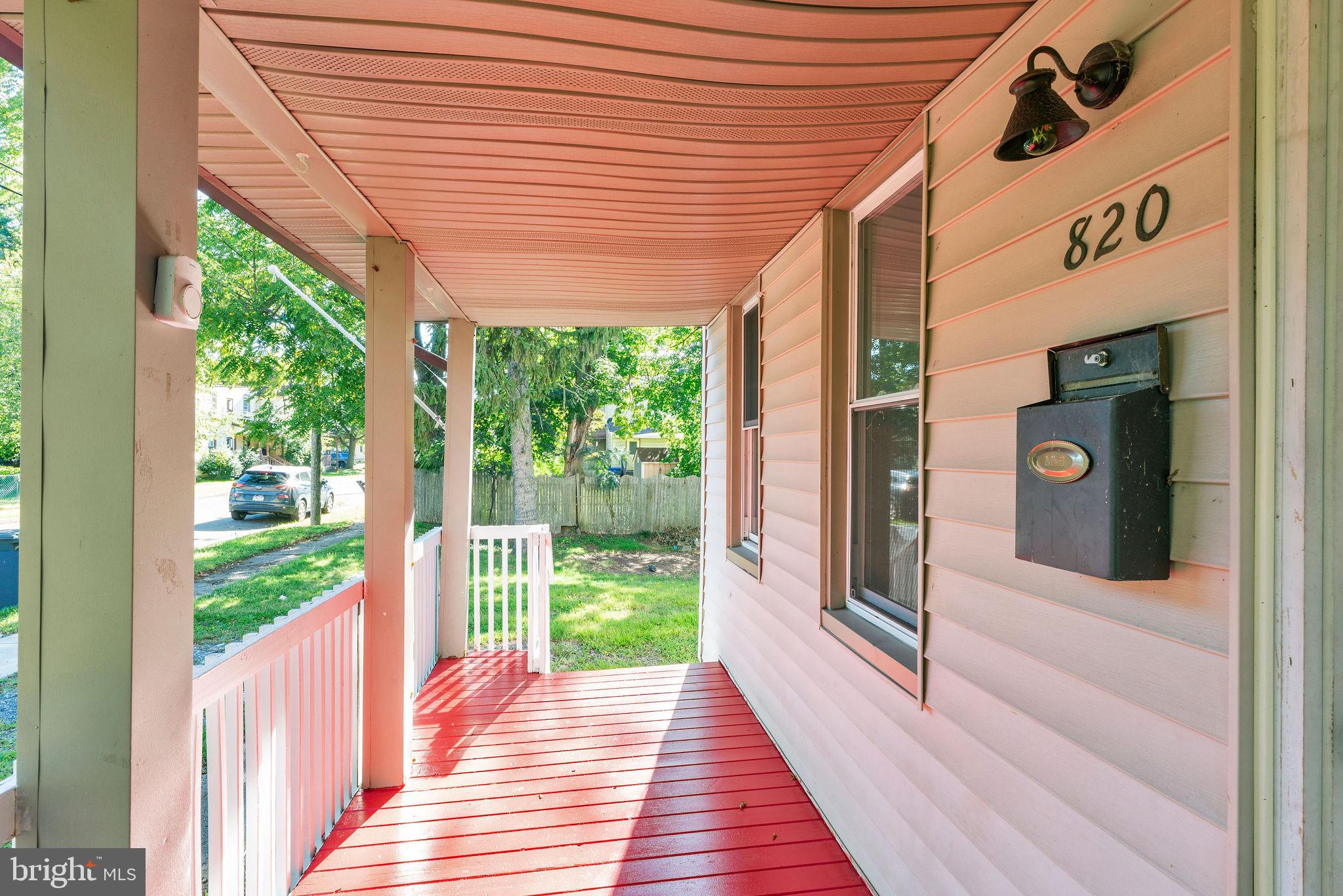 820 Laurel Street Delanco, NJ 08075 - Photo 4 of 24 Charming entryway with vibrant red accents.