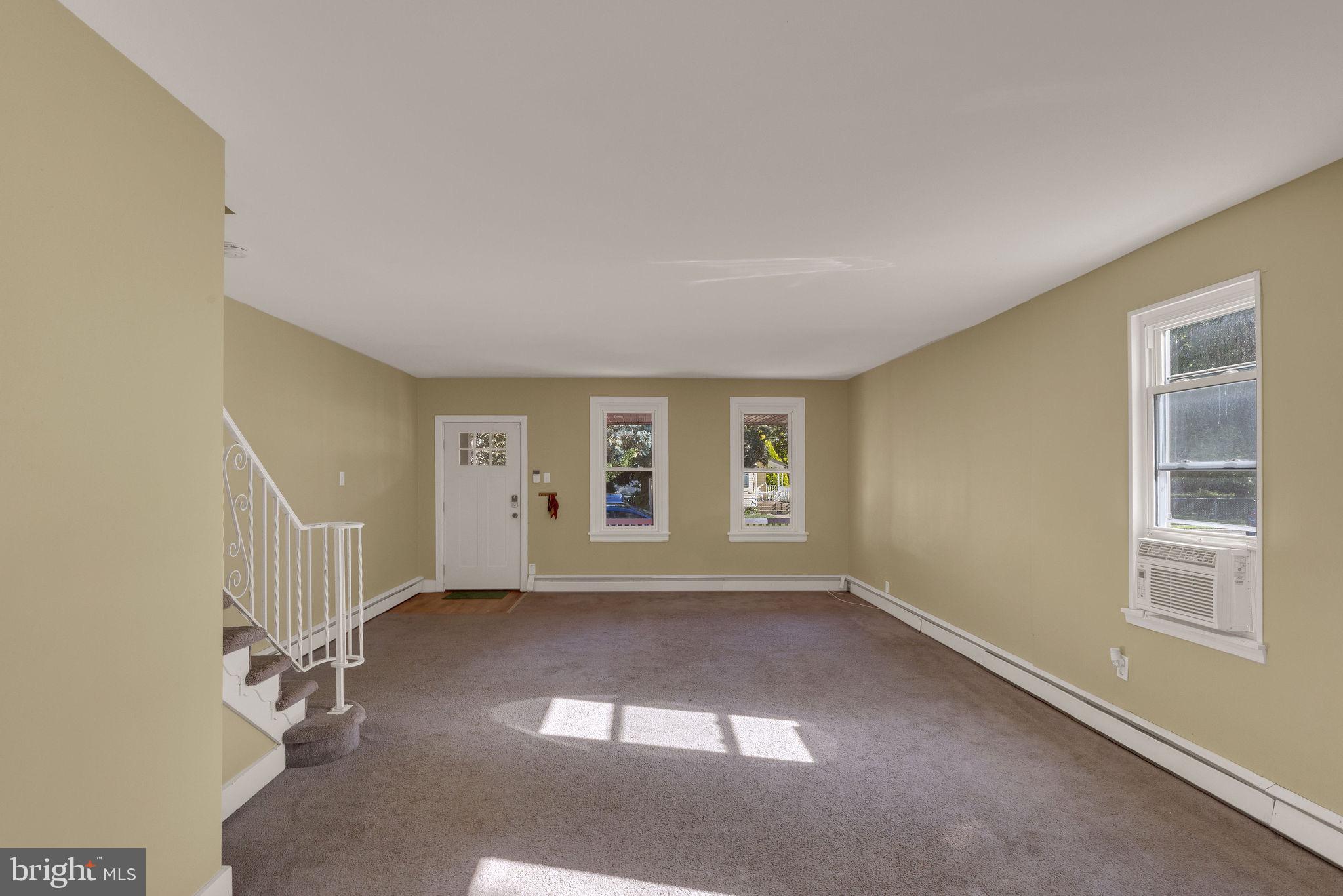 820 Laurel Street Delanco, NJ 08075 - Photo 8 of 24 Spacious, sunlit room with inviting charm.