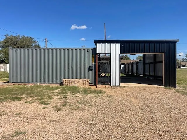 a view of an empty room with a fireplace