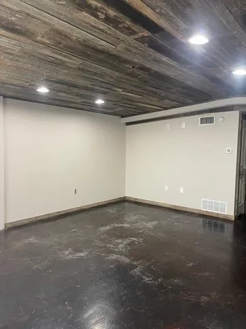 a view of a room with an empty space