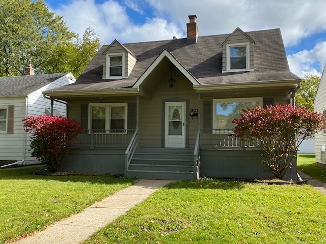 17843 Roy Street Lansing, IL 60438 - Photo 1 of 19 a front view of a house with garden