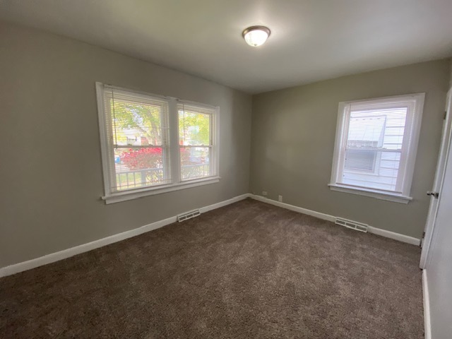 17843 Roy Street Lansing, IL 60438 - Photo 11 of 19 an empty room with windows