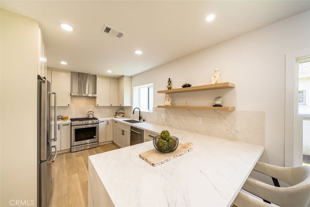 $1,465,000 | 3434 South Redondo Boulevard, Los Angeles, CA 90016