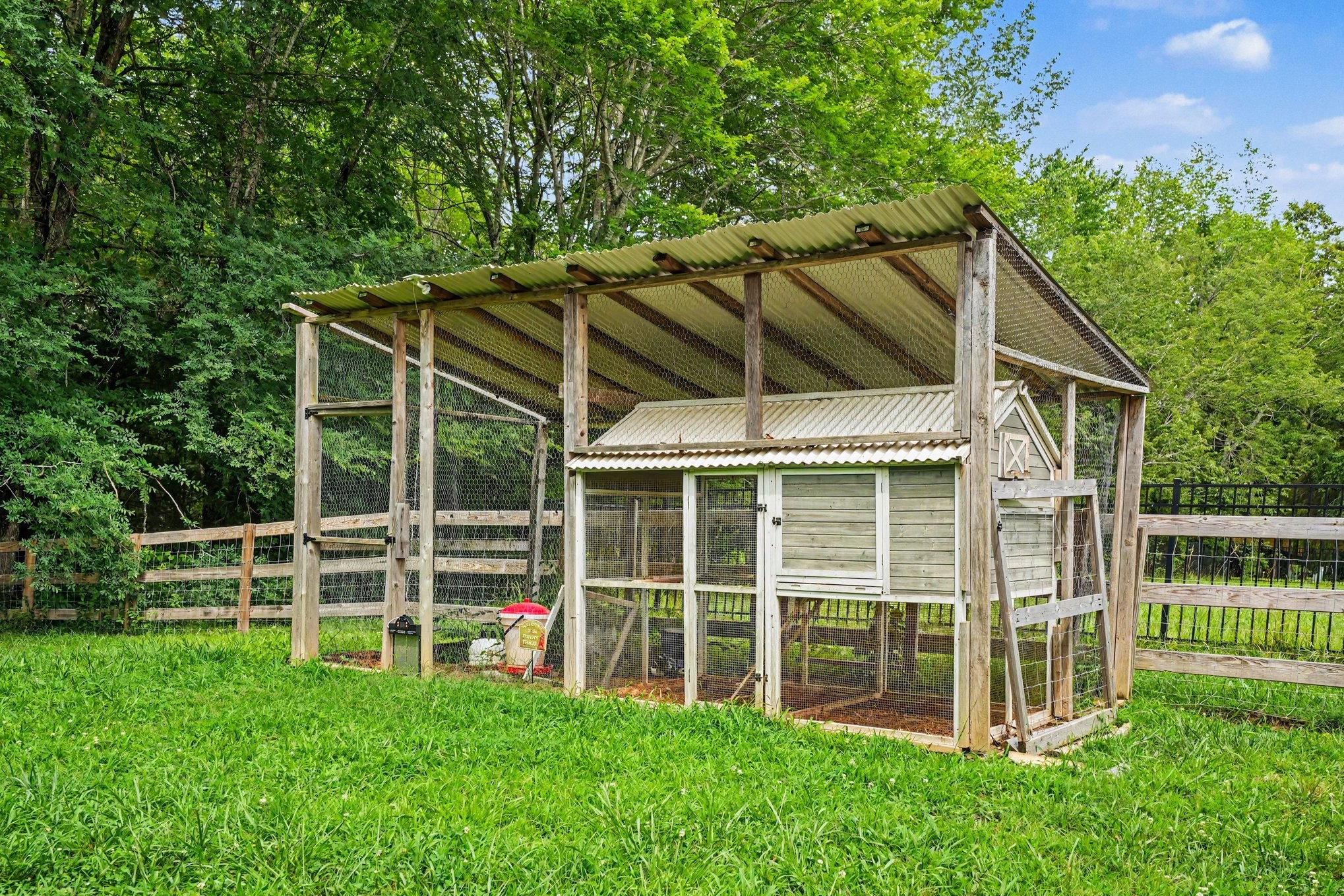 1415 Southside Road Southside, TN 37171 - Photo 28 of 35 a view of a backyard with plants and large trees