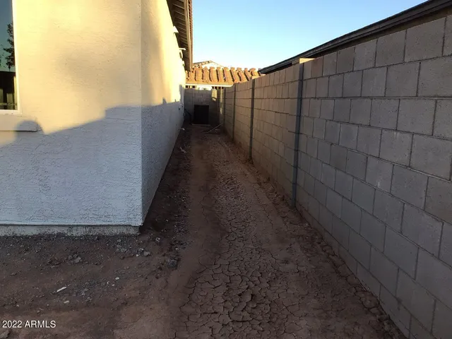 a view of a pathway with a building in the background