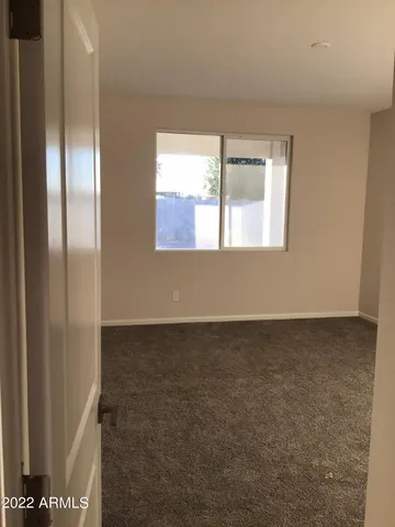 a view of hallway with natural light