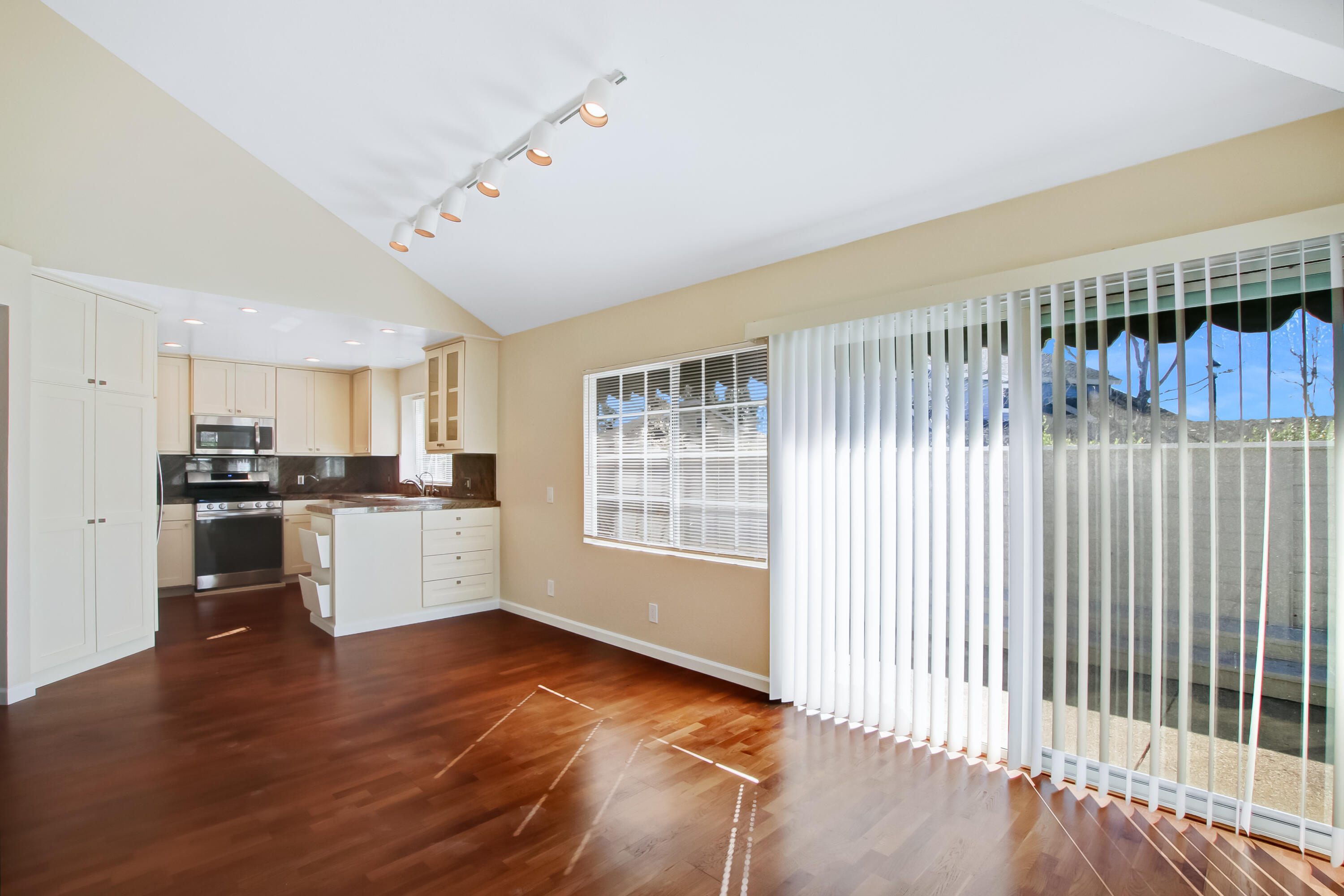 1541 Meadow Circle Carpinteria, CA 93013 - Photo 19 of 36 a view of a kitchen with a sink and dishwasher a oven with wooden floor