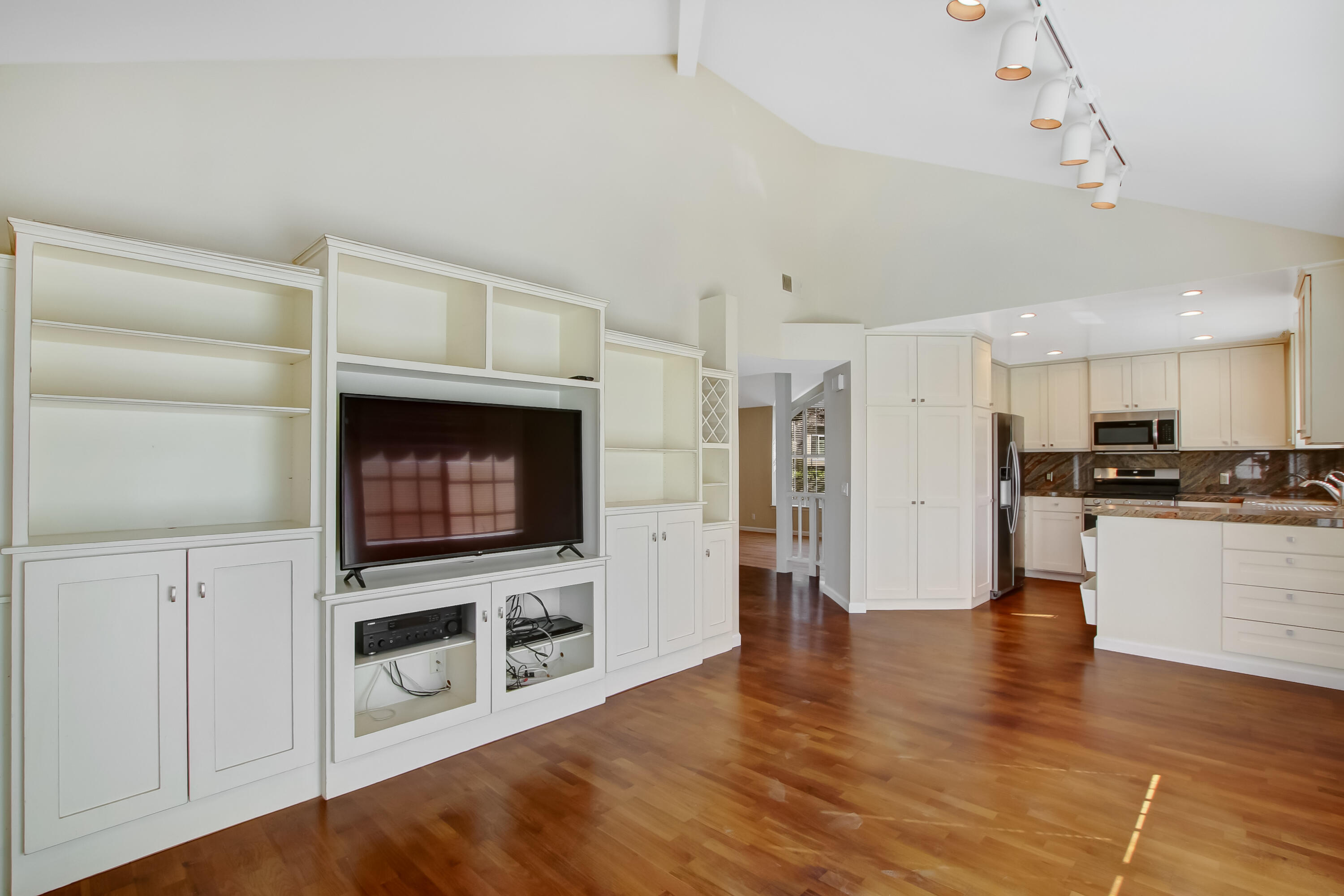 1541 Meadow Circle Carpinteria, CA 93013 - Photo 20 of 36 a view of kitchen with stainless steel appliances wooden floor and living room