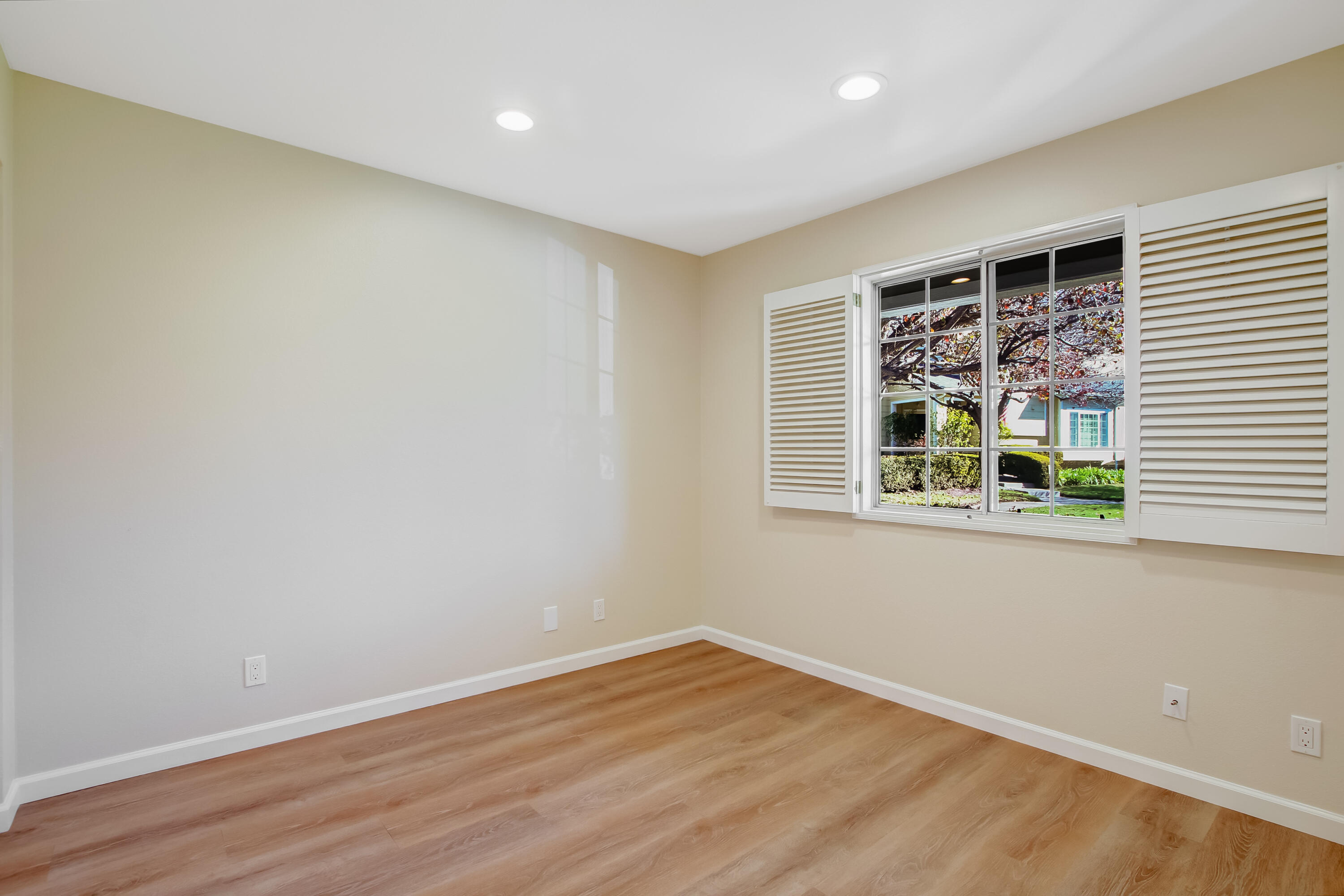 1541 Meadow Circle Carpinteria, CA 93013 - Photo 27 of 36 a view of an empty room with wooden floor and a window