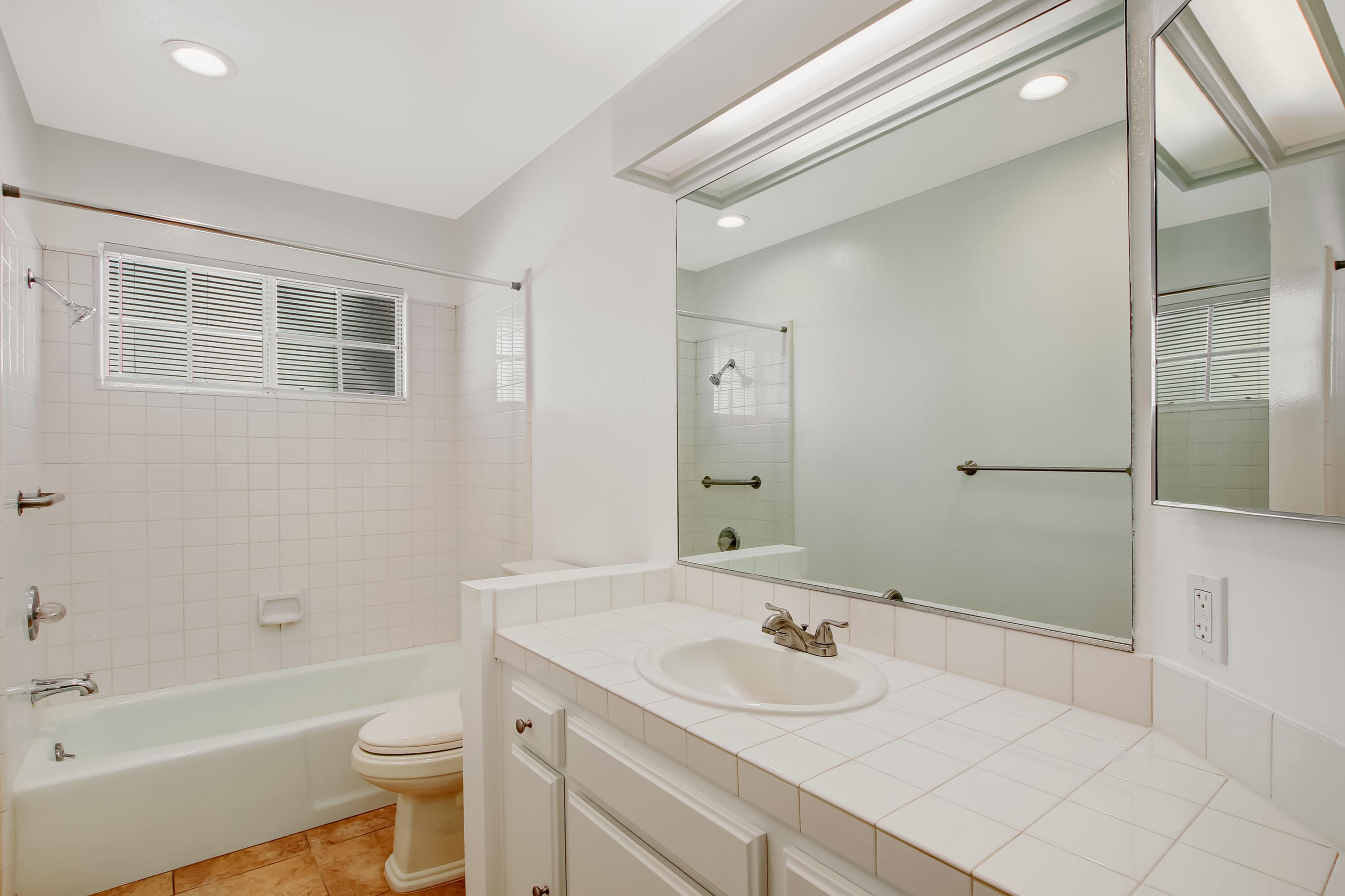 1541 Meadow Circle Carpinteria, CA 93013 - Photo 34 of 36 a bathroom with a sink and a mirror