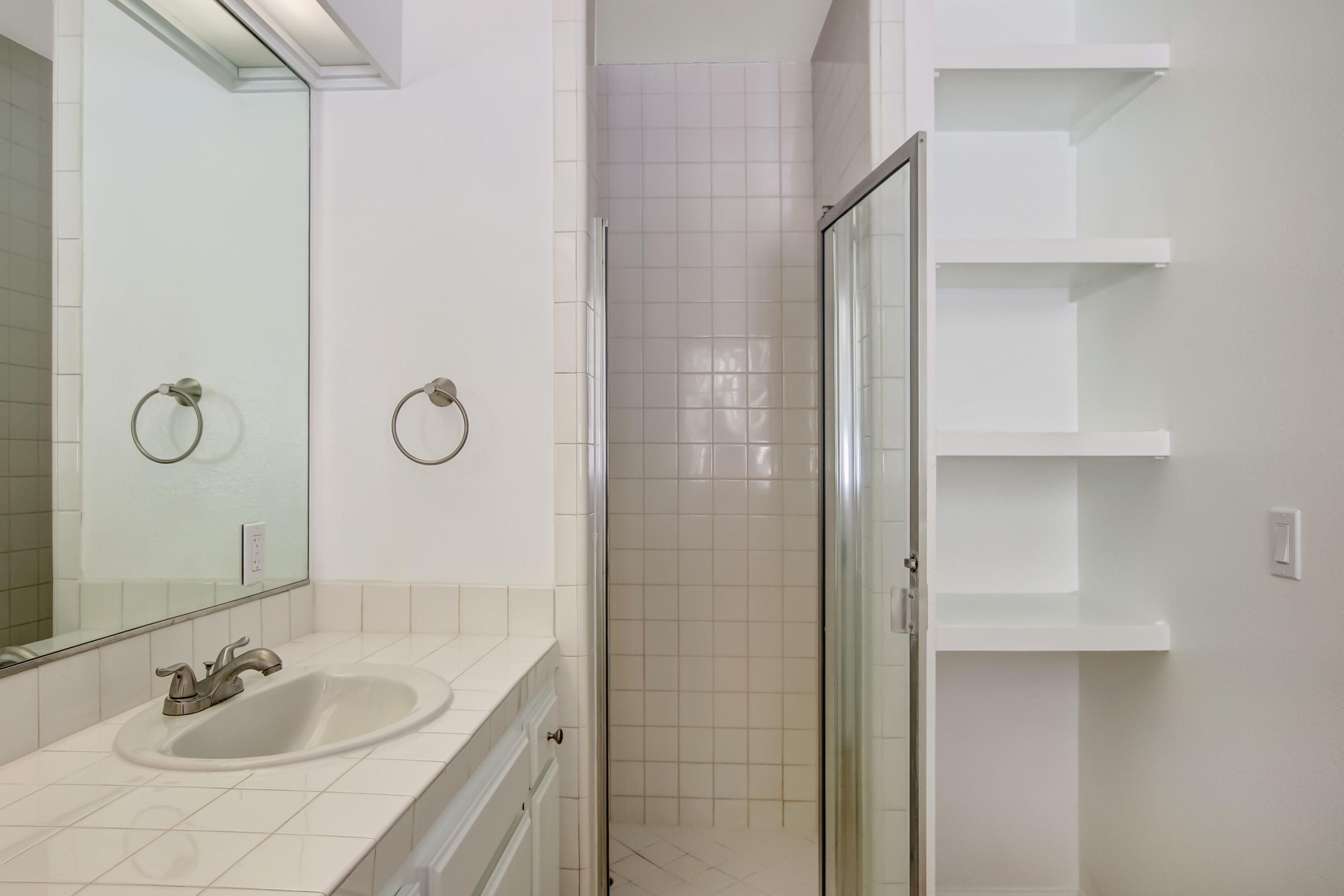 1541 Meadow Circle Carpinteria, CA 93013 - Photo 36 of 36 a bathroom with a sink and a mirror