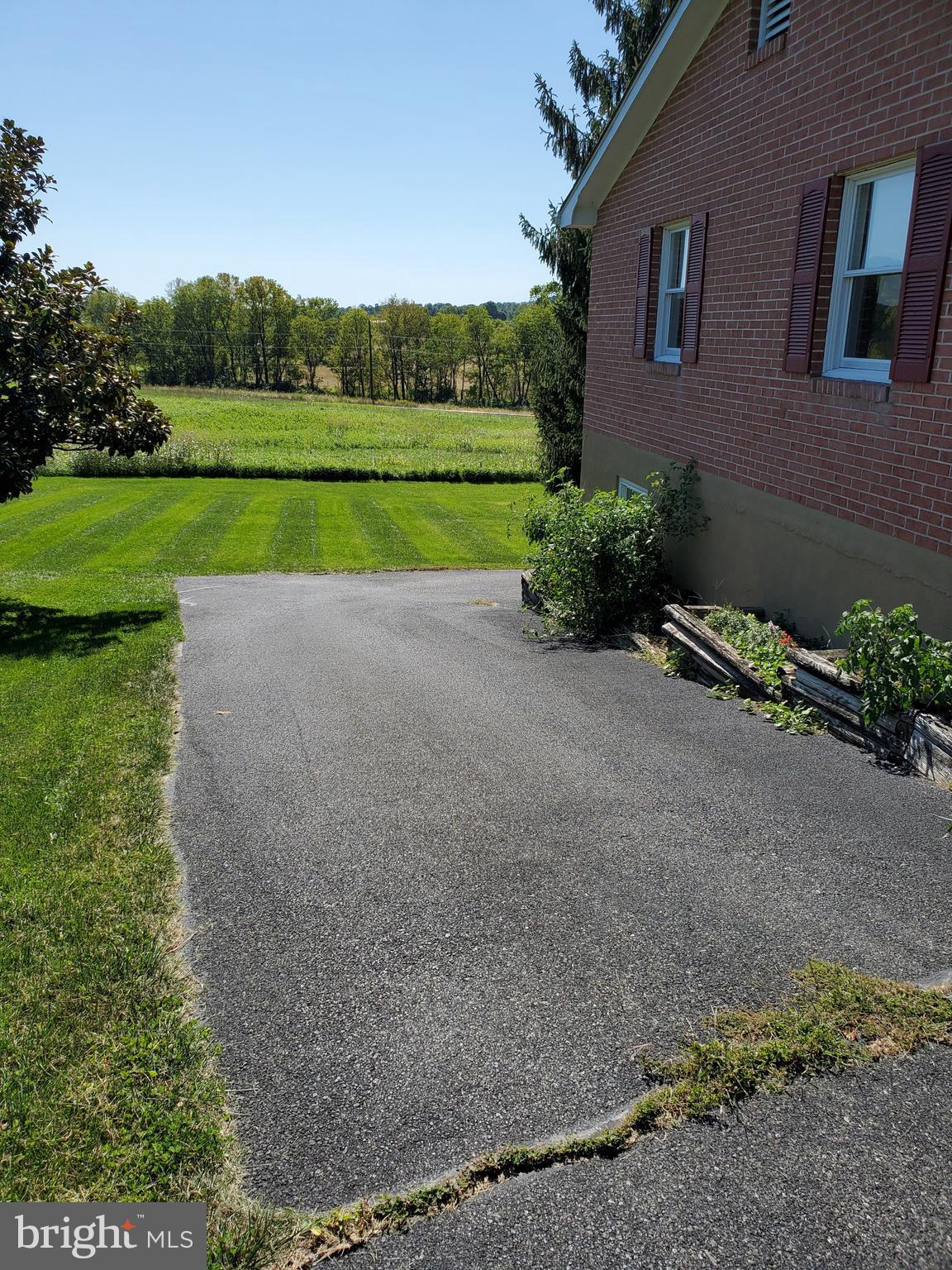 1035 Round Hill Road Winchester, VA 22602 - Photo 27 of 35 driveway that extends down to backyard